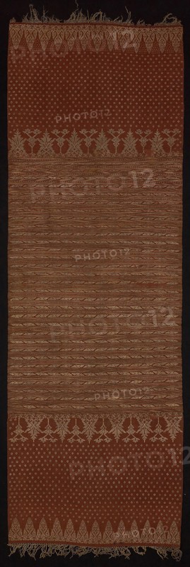 Ceremonial Shoulder Cloth, 19th century (?), Indonesia, Bali, Bali, Silk, cotton, bast fiber, and gold-leaf-over-lacquered-paper-wrapped silk and gold-paper-wrapped bast fiber (probably ramie), bands of weft resist dyed (weft ikat) plain weave and plain weave with supplementary brocading wefts, attached fringe of silk and silver-paper-wrapped silk, and gold-paper-wrapped bast fiber (probably ramie), wrapped and knotted cut fringe, 64 × 189 cm (25 1/4 × 74 3/8 in.)