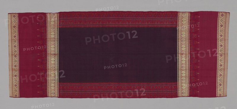 Woman’s Shoulder Cloth (Selendang limar), 19th century, Indonesia, Sumatra, Palembang, Sumatra, Silk and gold-leaf-over-lacquered-paper-strip wrapped silk, warp and weft resist dyed (warp and weft ikat) plain weave with supplementary patterning and brocading wefts, 219.7 x 87 cm (86 1/2 x 34 1/4 in.)