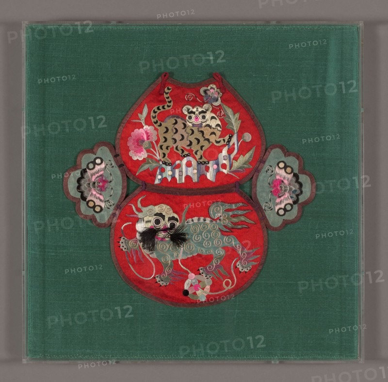 Child’s Collar, Qing dynasty (1644– 1911), late 19th century, China, Silk, satin weaves, embroidered with silk in satin, split, and stem stitches, laidwork and couching, edged with silk, satin weave, loops of silk, plain weave, 26.8 × 28.6 cm (10 1/2 × 11 1/4 in.)