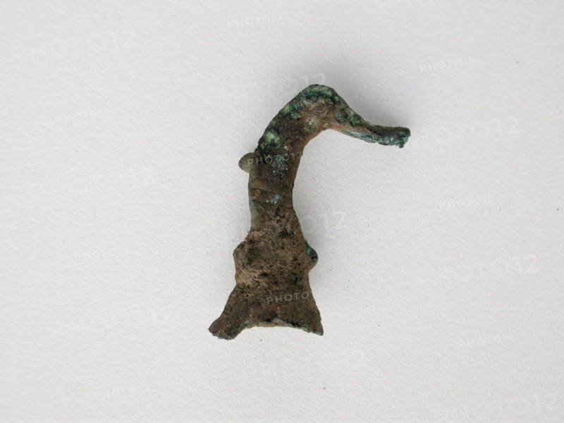 Bird Head Fragment, Geometric Period (800–600 BC), Greek, Thessaly, Greece, Bronze, 3.0 × 1.9 × 1.1 cm (1 1/8 × 3/4 × 3/8 in.), Jizo Bosatsu, Late 14th century, Japan, Wood with polychromy and gilding, H: 27 1/4 x  diam. 9 in.