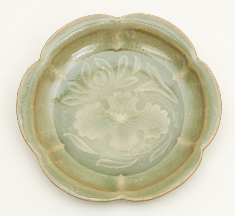 Dish with Petal-Lobed Rim, Lotus, and Waterweeds, Northern Song dynasty (960–1127), 11th/12th century, China, Yaozhou ware, stoneware with underglaze molded decoration, H. 2.8 cm (1 1/8 in.), diam. 10.9 cm (4 5/16 in.)