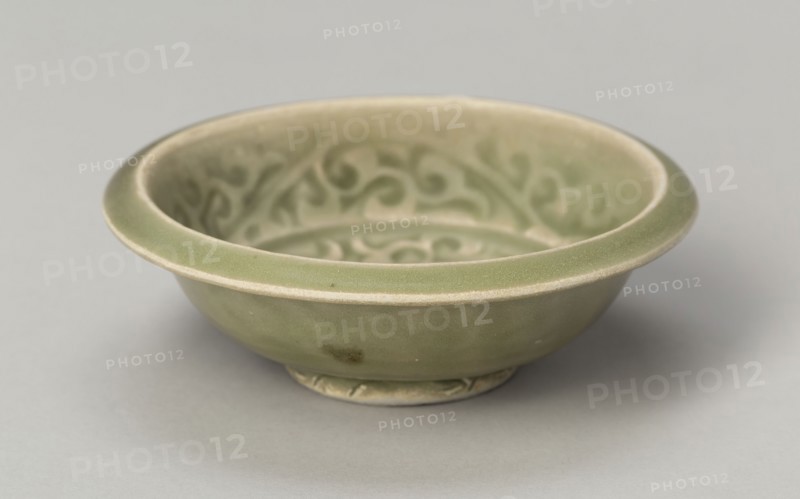 Basin with Stylized Flowers and Sickle-leaf Scrolls, Southern Song (1127–1279) or Yuan dynasty (1271–1368), c. 13th/14th century, China, Yaozhou ware, glazed stoneware with underglaze molded floral scroll, H. 3.1 cm (1 1/4 in.), diam. 8.7 cm (3 7/16 in.)
