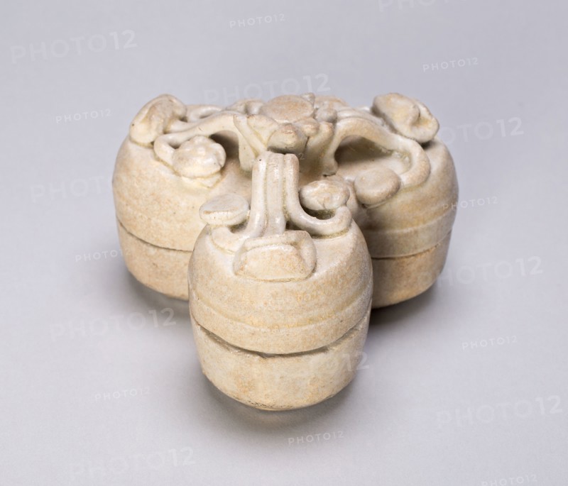 Triple Covered Box with Branches of Floral Heads, Song dynasty (960–1279), China, Celadon-glazed stoneware with molded and applied decoration, H. 5.7 cm (2 1/4 in.), diam. 7.3 cm (2 7/8 in.)