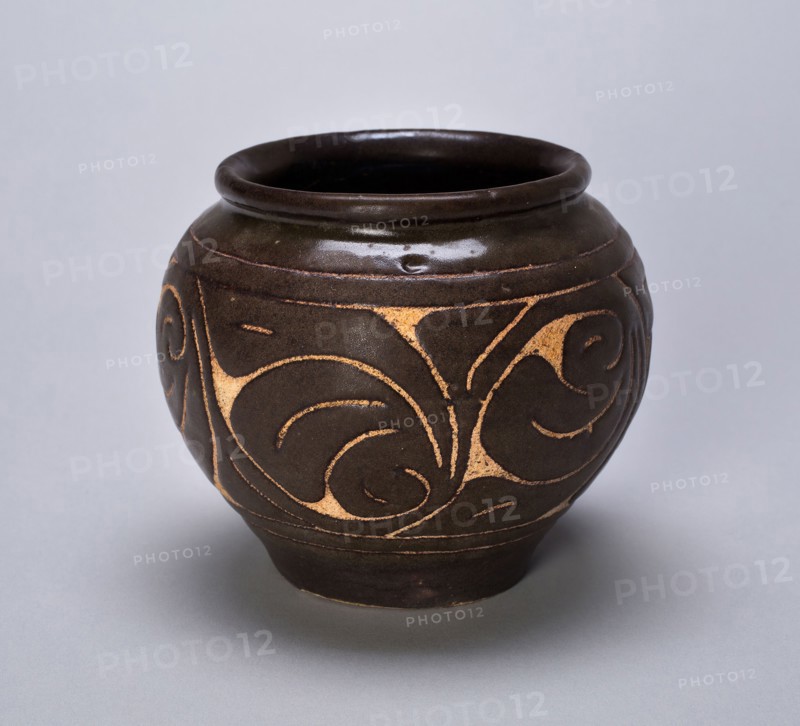 Small Globular Jar with Rolled Lip and Stylized Leaves, Jin dynasty (1115–1234), China, Cizhou ware, stoneware with carved-slip decoration, H. 9.7 cm (3 7/8 in.), diam. 11.2 cm (4 1/2 in.)