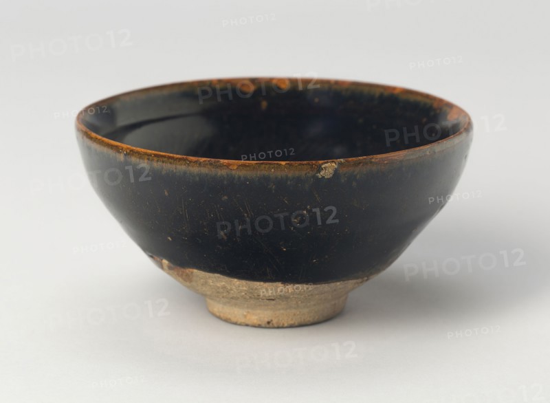 Bowl with Striated Petals, Song (960–1279) or Jin dynasty (1115–1234), c. 12th/13th century, China, Northern blackware, Cizhou type, stoneware with traces of overglaze silver or powdered gold decoration, H. 5.4 cm (2 1/8 in.), diam. 11.7 cm (4 5/8 in.)