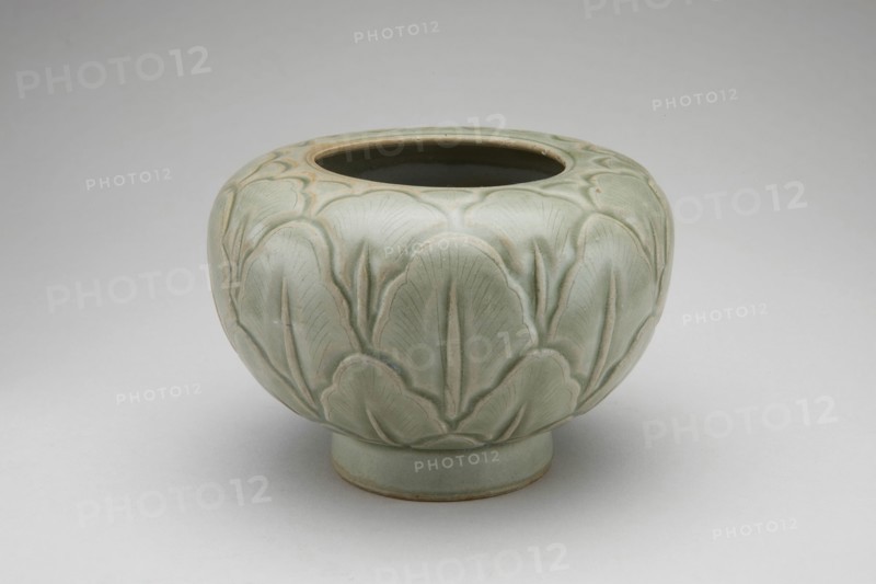Globular Jar with Overlapping Leaves, Five Dynasties period (907–960), China, Yue ware, stoneware with underglaze carved decoration, H. 7.9 cm (3 1/8 in.), diam. 10.3 cm (4 1/16 in.)