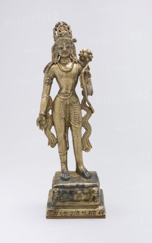 Standing Bodhisattva Avalokiteshvara Holding a Lotus Flower, early 9th century, Pakistan, Khyber Pakhtunkhwa Province, Swat Valley, Swat, Brass inlaid with copper and silver, 27.1 x 9.5 x 7.2 cm (10 5/8 x 3 3/4 x 2 13/16 in.)