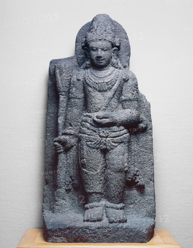 Bodhisattva Manjushri Holding a Blue Lotus (Utpala), 9th/10th century, Indonesia, Central Java, Central Java, Andesite, 74.6 × 35.4 × 22.9 cm (29 3/8 × 14 × 9 in.)
