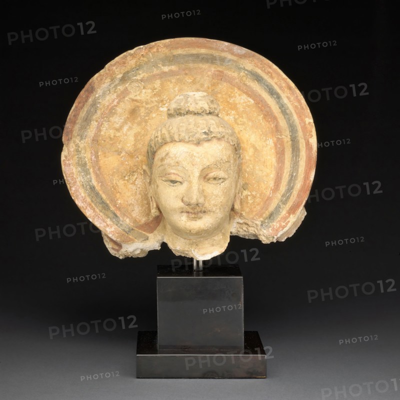 Head of Buddha, 3rd/4th century, Present-day Afghanistan or Pakistan, Ancient region of Gandhara, Gandhara, Stucco with pigments, 18.2 × 22. × 16.1 cm (7 1/8 × 9 × 6 in.)