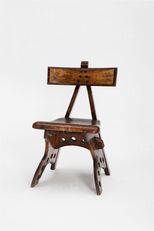 Granville Chair, c. 1870, Designed by Edward Welby Pugin, English, 1834–1875, Made by South East Furniture Company, Ramsgate, Kent, England, Oak and ebony with later iron plate, 82.6 × 55.9 × 45.3 cm (32 × 22 × 17 in.)