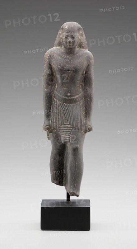 Egyptian, Statue of the Priest, Pa-ef-tchau-em-awy-Bastet, 595/589 BC, basalt, 9 1/4 x 2 3/4 x 2 3/4 in.