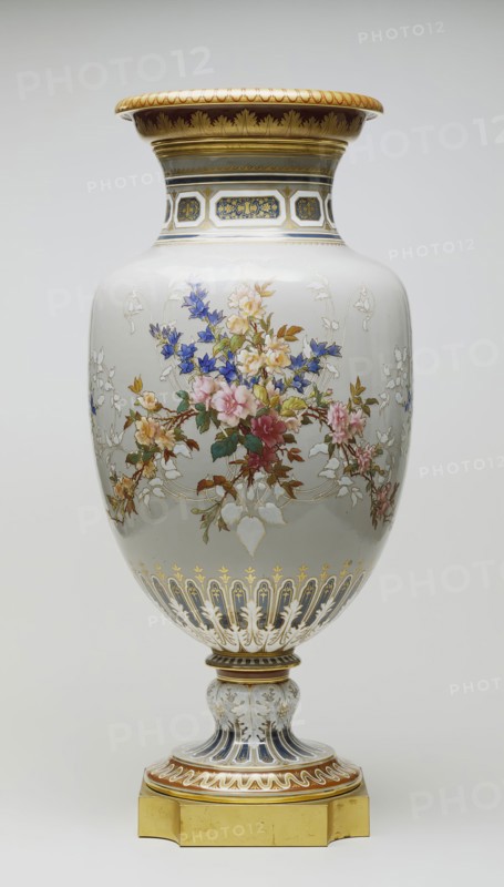 after a model by Jules-Constant-Jean-Baptiste Peyre, French, active 1845 - 1871, Henri-Lucien Lambert, French, active 1859 - 1899, Charles Ouint, French, active 1879 - 1890, Vase de la Vendange, between 1881 and 1882, hard-paste porcelain with demi-grand-feu colors (medium- intense-firing colors) pâte-sur-pâte ornamentation, gilding, and ormolu mount, Overall: 34 1/2 × 15 1/8 inches (87.6 × 38.4 cm)