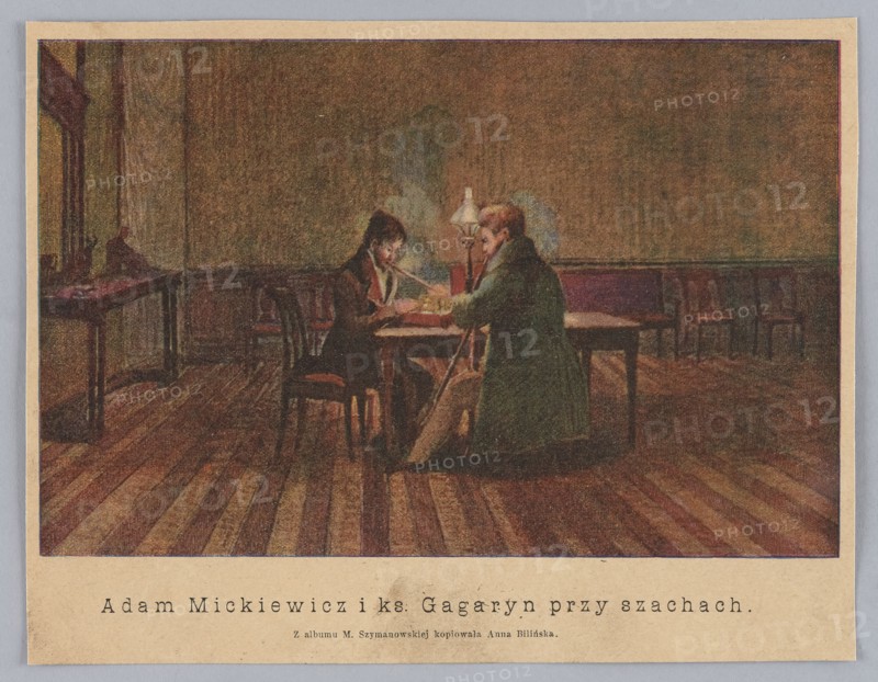 Reproduction of a drawing: Bilinska-Bohdanowicz, Anna 1854/1857-1893, Adam Mickiewicz and Prince Gagaryn at a chess game based on a drawing by Maria Szymanowska; painting, reproduction, Polish painting, genre scene of chess players in an interior, includes Adam Mickiewicz 1798-1855 iconography, Stefan Kulikowski 1871-1943, pipes, chess game, 1895, press illustration., A dimly lit interior scene shows a wooden floor with wide planks in brown and tan tones extending toward the back where a long wall in muted brown and green hues rises. Near the center, a table with a dark surface holds a small lamp emitting a soft pale glow, illuminating two seated figures; one figure wears darker clothing with hints of brown and black and sits at the left side of the table, leaning forward, while the other figure on the right wears a long green coat and is seated facing the first. Several wooden chairs with dark frames line the back wall and sides, and a side table along the left wall holds a dark objec...