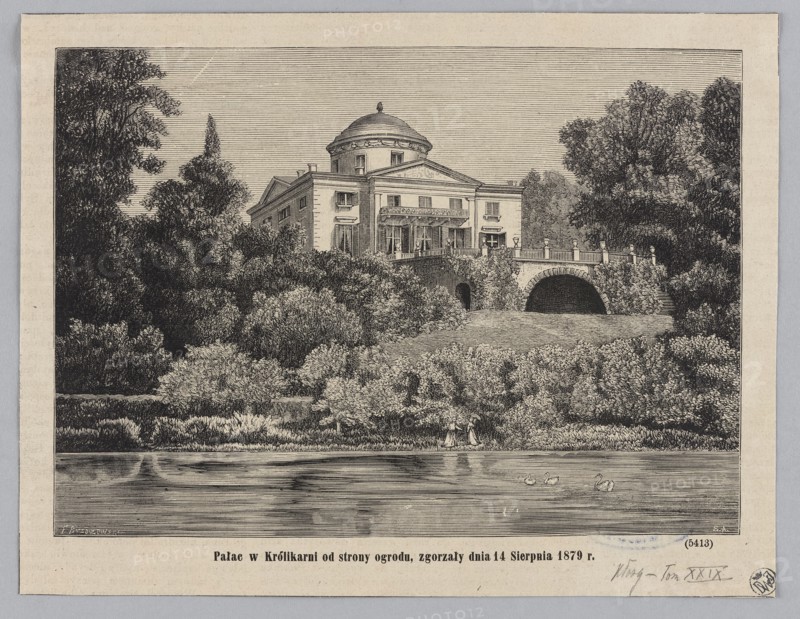 The Królikarnia Palace from the garden side, burned down on August 14, 1879; woodcut illustration after Feliks Brzozowski, woodcut artist Stanislaw Antoszewicz, 1879; depiction includes palace, gardens, park pond; classicist palace in Mokotów Warsaw; graphics/press illustration., A monochrome engraved scene shows a large classical building with a domed roof partially obscured by surrounding trees and shrubs, with an arched stone bridge attached to the building and balustrades along its top; a grassy slope and dense foliage lead down to a calm body of water that reflects the scene, with a group of waterfowl floating near the foreground and a few people standing at the water’s edge beneath the trees. The visible colors are black, white, and shades of gray.