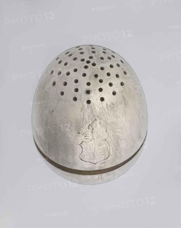 Salt cellar, scrap - purchase, spices vessel, salt vessel, spice vessels, 19th century, St. Petersburg, Russia, vessel, height 4 cm, width 3.1 cm, A rounded metallic object with a dull silver-gray surface sits against a light gray background, showing a pattern of several circular perforations on its top and a visible seam around its middle; the metal displays numerous scratches and scuff marks and a faint engraved outline on one side, with darker gray shadows around some holes and along the seam.