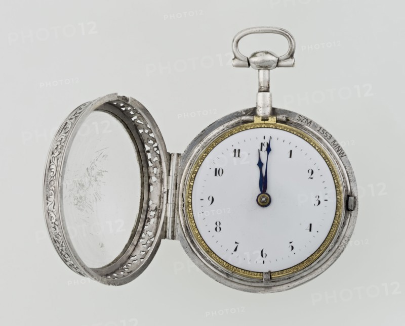 Pocket watch, maker: Carl Willougby; repossession provenance; openwork case; acanthus scrolls, fish scale ornament, shells, birds and masks male and female as decorative motifs; openwork mechanism decorations. Pocket watch with striking function, silver in a partially openwork case, richly decorated with engraved ornament covering the entire surface of acanthus twig and flowers, among which birds and two masks; in the centre a circular reserve made of acanthus twig, volutes and fish scales, inside a bell. Glazed lid enclosed by an openwork frame decorated with a floral twig and a broken ribbon. Mechanism between two circular plates supported by columns, with a spindle escapement, a worm with a chain, and a balance drum. Gilded, openwork crown with an engraved acanthus twig, combined with an openwork foot and a woman's mask. White-enameled dial edged with a gilded, knurled ribbon, hour markers in Arabic numerals, minutes marked with vertical lines; steel hands. 2nd quarter of the 18th c...