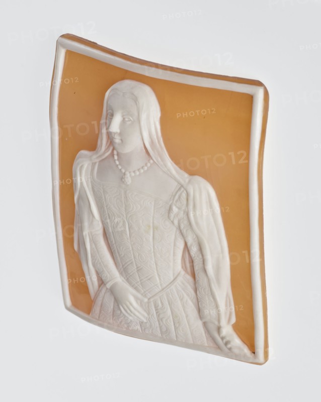 Cameo with a portrait of Bona Sforza d'Aragona 1494–1557, wife of Sigismund I the Old. Portrait of a young woman in 3/4 length with her head turned slightly to the right and her gaze directed at the viewer, wearing a veil covering her shoulders, a dress with a square neckline, flat bodice, belt, pleated skirt and narrow sleeves decorated at the top with a roller; right hand at belt height, left hand lowered, revealing the veil. Portrait of Bona Sforza d'Aragona, based on a miniature, dated 1518 subject, 2nd half of the 19th century. Italy, Torre del Greco. Gemma, bas-relief; height 5.1 cm, width 4 cm. Made by Gaetano Bianchini Florence; glyptic and merchant firm; fl. ca. 1850–1900., A carved relief of a woman set against an amber background, with the figure rendered in white and ivory tones; she has long hair draped over her shoulders and wears a detailed bodice and flowing sleeves with textured patterns, and a beaded necklace around her neck; her hands are visible, one resting near he...
