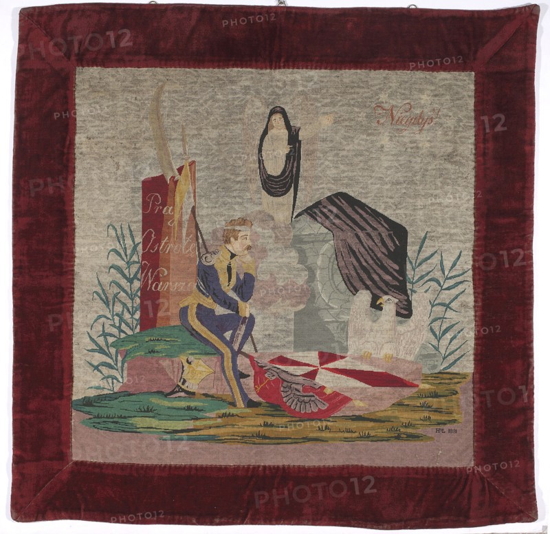 Wall-hanging picture, wall-hangings, November Uprising 1830–1831, embroidery, White Eagle coat of arms, scythes, lances, banners, columns, inscriptions. Wall-hanging embroidered in fine cross-stitch depicting a symbolic scene: in the foreground a wounded soldier; behind him a column inscribed Praga, Ostroleka, Warsaw. In the background an angel; below, a gun carriage covered with a pall and the White Eagle. Trim of dark cherry plush. An angel, also draped in a pall, points to the inscription Once. Behind the uhlan are a scythe and lance with a pennant leaning against the column. In front of the uhlan are banners on the ground, next to them a White Eagle. In the lower right corner are the letters and date HL1831. 1831, Poland; fabrics; height 70 cm, width 70 cm., A textile panel framed by a wide dark red border shows a scene woven in muted colors on a beige background: a seated figure in a dark blue outfit with yellow trim rests on a green patch of ground, holding a long staff and facin...
