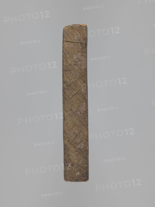 Double-sided gingerbread mould. Rectangular shape; obverse: man in 18th-century attire tricorn hat, justokor, culottes, long boots seated on a goat, carved inscription at the bottom: EIN SCHÖNER BOCK EIN GUTER / PFERD IST EINER GN ... DIE ZIGE WERT, with plant and floral ornament beneath; reverse: Adam and Eve in Paradise wearing leaf loincloths before the Tree of Knowledge with a coiled serpent; above them a bearded figure holding an orb probable God with sun, moon and stars in the heavenly vault; animals around Adam and Eve cat, deer, bird, cow, squirrel; composition within a round decorative frame with a plant twig motif. Gingerbread mould, wood. 18th–19th century, Silesia 1742–1918. Height 21.4 cm; width 24 cm; depth 3.7 cm. Subjects and motifs: animals, riders, folk-style decorations, Adam and Eve, plant and floral motifs, historical costumes, original sin, pomegranates, snake, religious motifs, decorative art, customs., A vertically oriented rectangular wooden object with worn, r...