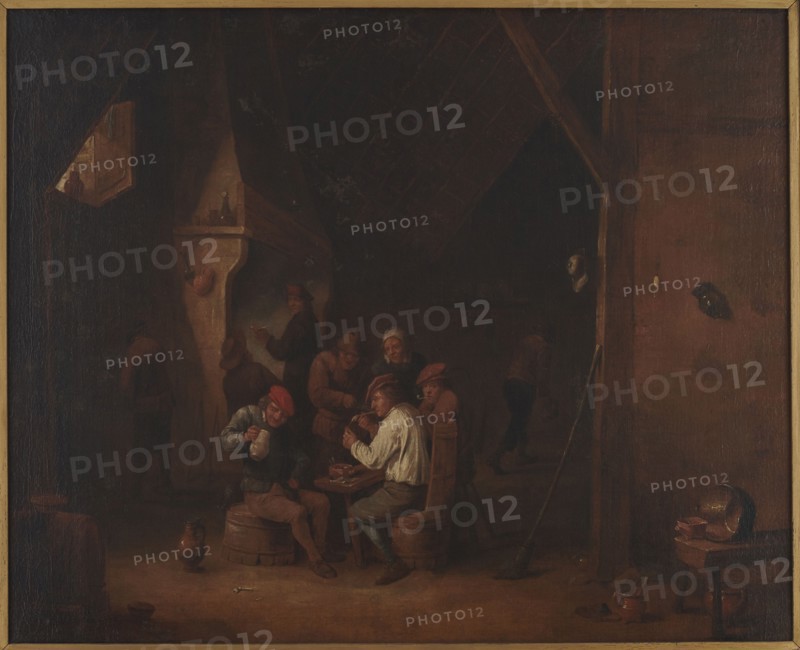 At the Inn, Teniers, David II 1610-1690 painter copy, visual documentation, painting, genre scene, inns, Flemish painting, copies, 18th/19th century, painting, height 68.5 cm, width 84.5 cm, A dimly lit interior scene shows a group of people gathered around a small wooden table beneath a steep, dark ceiling, with a few seated figures on wooden stools and barrels and several standing figures clustered near a large hearth; the colors visible include deep browns, dark reds, muted ochres, soft creams, and touches of black, with a few red hats and a pale shirt standing out against the shadowed background, and various earthenware jugs and bowls in brown tones scattered on the floor and on a small table at the right, a long pole leaning against a wooden post, and a small framed opening in the upper left revealing a lighter patch beyond.