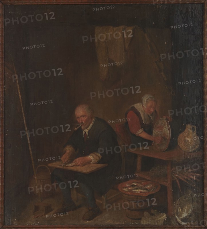 Fish Scraping, Brekelenkam, Quiringh van post 1622/1630–1669/1679 painter; 17th-century Dutch painting; oil on panel; subject: interior scene with women and men scraping fish, wicker baskets and jugs; height 44 cm, width 40 cm., A dimly lit interior scene with brown and dark tones dominates the image, showing a man seated in the foreground wearing dark clothing with a light scarf at his neck and a pipe in his mouth, holding a flat board on his lap and working with his hands; beside him is a woven basket and a long pole leaning against the wall. In the midground a woman with a white head covering and red sleeves leans over a wooden table, handling a round object with textured surface; a large jug with a pale, mottled surface sits on the table. In the lower right there is a wooden tub topped by a plate of fish with silvery sheen, and scattered wooden and pale objects lie on the floor nearby. The background is mostly shadowed brown, with a draped cloth of muted tan hanging on the wall and...