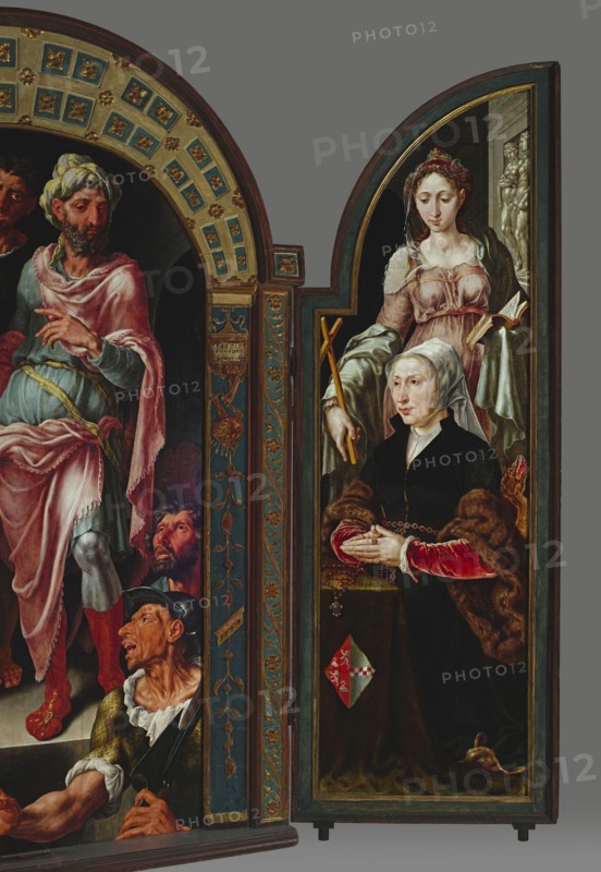 Ecce Homo Triptych, donor portraits on the wings, Maarten van Heemskerck 1498–1574, painter; Ecce homo iconography; Pontius Pilate prefect of Judea, fl. 26–36; Jesus Christ; religious scenes; Margaret the Martyr St., ?–ca. 303–305; Netherlandish painting; John the Evangelist St., ?–ca. 100 — iconography; portraits; chalice attribute; dragon attribute; Jan van Drenckwaerdt ?–1549; Margaretha de Jonge van Baertwyck ?-1542; female portraits; male portraits; triptych; 1544; painting. Dimensions — central part: height 167 cm, width 88.9 cm, thickness 13 cm; with frame central part: height 188.6 cm, width 132.7 cm, thickness 13 cm; right wing: height 183.5 cm, width 64.8 cm, thickness 5.5 cm; left wing: height 183.5 cm, width 62.5 cm, thickness 5.5 cm., A painted panel showing a seated older woman wearing a white head covering and a dark dress with fur-trimmed sleeves and red inner sleeves, her hands clasped over a small table draped in a dark cloth; behind and slightly above her stands a yo...