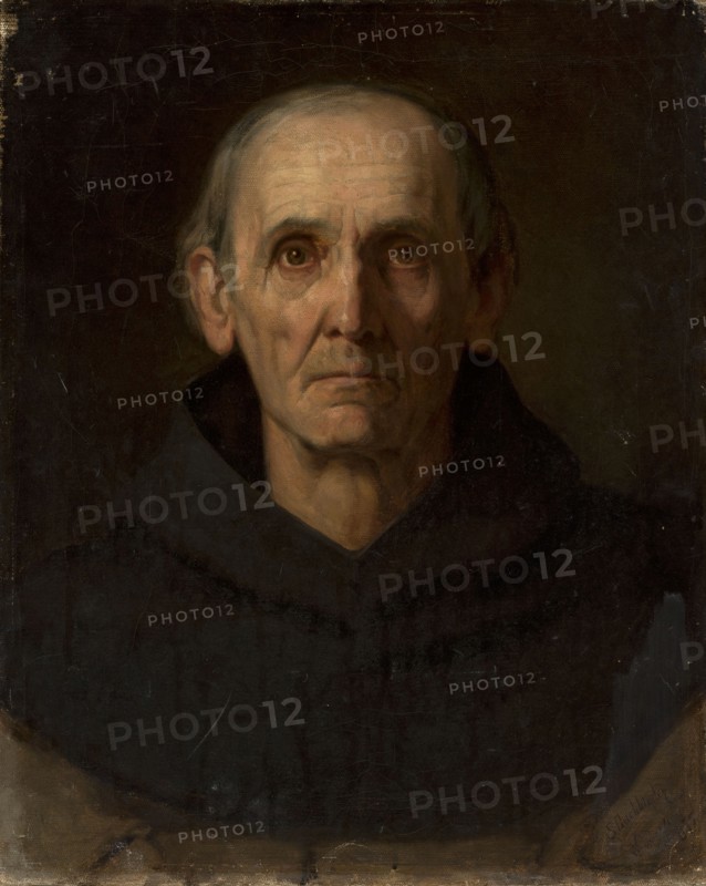 Head of a Monk, Buchbinder, Szymon 1853–1922 painter, 1875, painting, height 55 cm, width 45 cm, An older man shown from the shoulders up wears a dark hooded garment and faces forward with a neutral to solemn expression; his skin is pale with visible wrinkles and shadows, his eyes are deep-set and brown, his hair is thin and gray around a mostly bald scalp, and his ears are prominent. The background is dark and muted, with shades of brown and black, and the clothing is very dark, nearly black, with subtle variations of deep brown and gray. The overall palette includes flesh tones, gray, brown, and black.