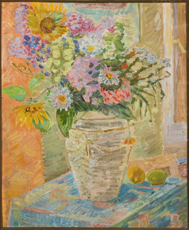 Flowers in a Vase, Waliszewski, Zygmunt 1897-1936 painter, contemporary painting, interwar period, flowers in vases, On a table covered with a blue tablecloth, a bulging vase of flowers, on the right behind the vase two lemons., 1930s, Poland, painting, height 77 cm, width 64 cm, A painted still life shows a large textured vase holding a loose, abundant bouquet with a few sunflowers, several daisy-like blossoms, and a variety of other blooms rendered in thick, visible brushstrokes; colors visible include yellow, green, pink, purple, blue, white, orange, red, beige, and brown. The vase sits on a patterned cloth with blue and teal tones and touches of pink and yellow, and a pair of round fruits in yellow and green rest beside it. The background includes warm peach and tan wall tones and a vertical lighter area suggesting an opening, all framed by a thin brown border.