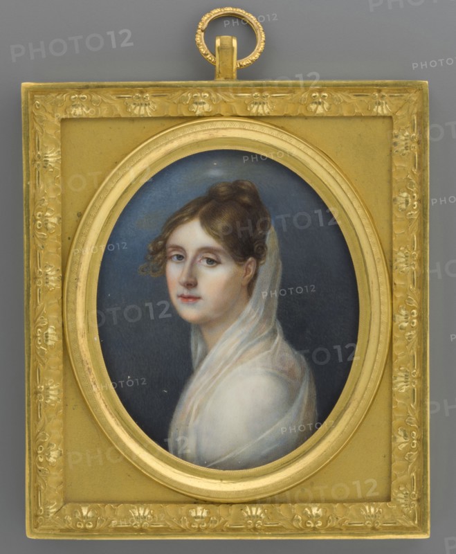 Aniela Czartoryska en Vestale née Radziwill 1781–1808, Lampi, Jan Chrzciciel 1773–1837 ; young painter; unknown painter?. The reference to the strict customs of Roman women worshippers of the home emphasized the virtues of a good and faithful wife. The Duchess is depicted in a profile bust with her head turned three-quarters to the left against a neutral navy-blue background. Her dark blond hair, styled in the antique fashion, is covered with a transparent white veil over her shoulders and back, and her bustier, so-called vestal gown, is also white. This is a commemorative portrait highlighting her charming figure; her statuesque facial features, as if carved in marble, convey an otherworldly, antique-like element of eternity. 1800; miniature; height 8.4 cm, width 6.9 cm., A small oval portrait of a woman set within an ornate rectangular frame; the frame is gold with intricate floral and decorative relief around its border and a circular hanging ring at the top, and the inner oval mat ...