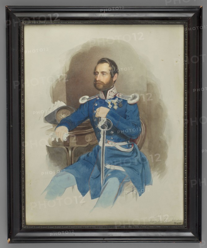 Prince Edward of Saxe-Altenburg 1804–1852 in the uniform of a general of the Bavarian cavalry, painted by Ernst Wilhelm Rietschel 1824–1860, military portrait en trois-quarts, seated interior figure, wearing uniforms and orders including Order of the Saviour Greek, Bavarian Cross of the Auxiliary Corps, House Order of Hohenzollern December 1841, and Order of St. Hubert before 1844; inscribed bottom right: SA Edouard / Duc de Saxe-Altenbourg / M. 1521; dated 1842–1843; Germany; miniature; height 33.9 cm, width 27.0 cm., A framed portrait shows a seated man wearing a blue uniform with decorative shoulder epaulettes and metallic embellishments, holding a sword vertically with one hand while the other rests on a small wooden table. The man has dark hair and a beard and looks slightly to one side. Behind him are muted gray and brown background washes, and a dark hat rests on the table. The scene includes shades of blue, brown, gray, white, black, and tan, with the frame appearing dark brown...