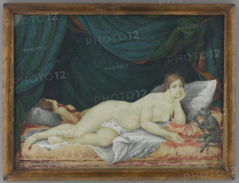 Reclining Venus with a Monkey and a Cupid, Bechon, Karol Charles 1732-1812 painter. Cupids, nudes, antiquity, animals, interiors, symbols, Polish miniatures, mythologies. Venus lying on a bed covered with red fabric; a monkey with a triangle sits at the head, a cupid sleeps at her feet. In the background an emerald curtain. Signed: inre et fait par Ch. Bechon / a. Varsovie 1796. On the reverse, an illegible inscription in pencil and a round label; inside the circle an ink inscription 2501/Ter. Binding: secondary, narrow wooden board. Illustration made in miniature technique. Miniature, height 14.2 cm, width 19.5 cm., A reclining nude woman with pale skin lies on a bed draped with white and red cushions and sheets, propping her head on one hand and looking toward the viewer; a small dark gray monkey sits near her outstretched hand holding a thin object, and a reclining child with light brown hair rests on a pillow behind her holding a round fruit. The background is dominated by deep gre...