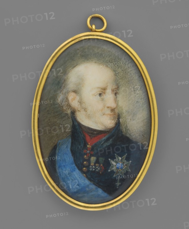 Charles XIII, King of Sweden 1763–1844, unknown artist, portrait miniature, ca. 1800; subject: ruler in uniform with orders; male portrait; height 5.3 cm, width 3.5 cm., An oval pendant with a gold frame containing a painted portrait of a light-skinned person shown from the shoulders up, turned slightly to the viewer's right; the person has pale hair pulled back and a neutral expression, wearing a dark coat with a high collar, a blue sash across the chest, and several small medals plus a star-shaped decoration; the background inside the pendant is a muted mix of gray and green, and the frame and suspension loop are gold.