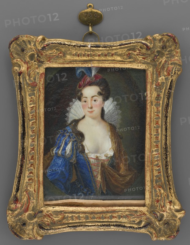 Friederica Elisabeth Clotz ? 1713–1743 in a ball gown, unknown painter; copies paintings in art prints; costumes from the beginning of the 17th century; portraits waist-length; women's portraits 3/4 left; dresses with ruff, deep neckline; foreign miniatures. Seated, full-length turned to the right, holding a miniature of Emperor Francis I of Rome, in widow's robes—black crinoline, black veil, white cuffs, wearing white gloves. An emerald-ruby star-shaped cross on the left breast. Next to her, a brownish table with a gray-celadon top bearing a written piece of paper, a book, and a black fan; at left a column and above it a blue-gray patterned curtain. Background: gray wall decorated with stucco. Frame: gilded wood, rectangular strip, pearl ornament around, stylized roses. Date: 1750 –1850 ; Germany. Miniature, height 9.0 cm, width 7.0 cm., A painted portrait of a woman in an ornate carved frame, the frame showing gold and worn red accents with an aged patina and a small hanging loop at ...