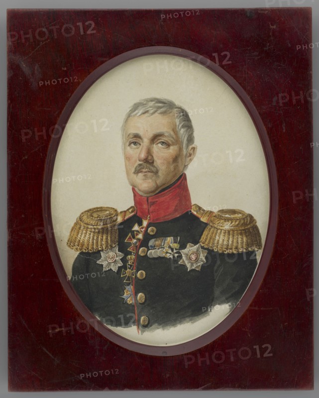 General Pawel Yakovlewicz Kuprianov 1789–1874 old attribution portrait of Lieutenant General Aleksander Despot-Zenowicz 1829–1897, who took care of Poles in exile; painter: Stanislaw Marszalkiewicz 1789–1872. En face miniature portrait of a man in uniform, subject bust slightly to the left, elderly man, gray hair closely cropped, dark blond mustache, gray eyes. Russian infantry division general uniform, dark green with a red collar, gold buttons with double-headed eagle, gold epaulettes; wears 2 order stars, 5 crosses, and 3 medals on the chest including Polish Badge of Honour, Order of St. George, Order of St. Vladimir, Order of St. Anne star, Order Pour le Mérite. Style: Polish miniatures. Date/period: circa 1830s inscription/attribution notes cite 1832. Medium: miniature on paper. Dimensions: height 14.5 cm, width 11.0 cm. Binding: rectangular mahogany frame with beveled oval cutout. Label on reverse: Niew. / 1484., An oval-framed watercolor portrait set in a rectangular dark reddis...