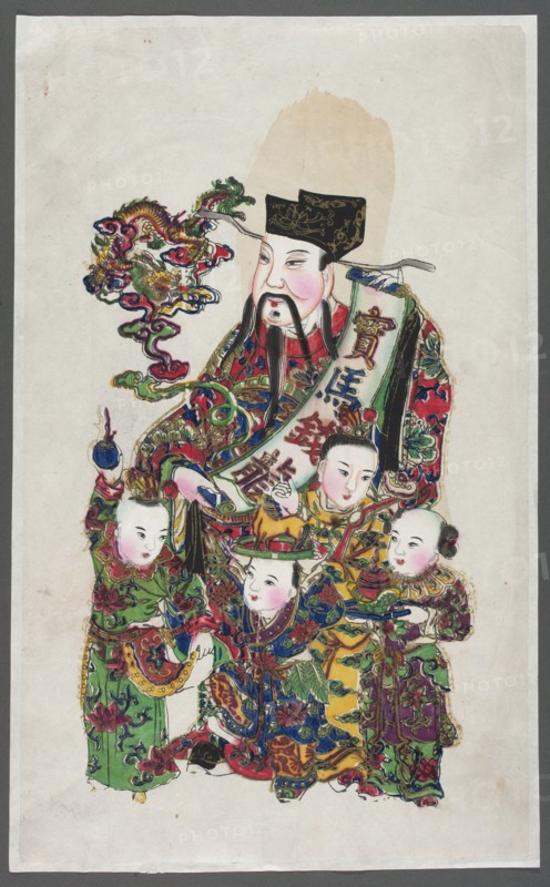 Menshen Gate Guardian surrounded by children; nianhua New Year's picture, Menshen Gate Guardian iconography, images of children; Chinese art; Chinese culture; early 20th century; Yangliuqing; graphic print; height 59.2 cm, width 36.0 cm., A seated adult figure wearing an ornate black hat and a richly patterned robe in red, green, blue, yellow, and purple is surrounded by a group of children in colorful traditional clothing; the adult has a pale face with a mustache and long dark beard and holds a long decorative banner partially draped across the group, while a swirling, dragon-like multicolored cloud in green, red, purple, yellow, and blue appears to the left of the adult’s head; the children wear garments with floral and geometric designs in green, blue, yellow, purple, red, and gold accents, and one child holds a small round object, another wears a hat with decorative elements, and another grasps a small animal-shaped object; the background is a plain light paper with subtle stains ...