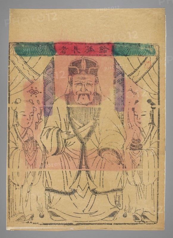 Main Deity of Immortal Foxes, unknown artist, Chinese, Chinese art, nianhua New Year's picture, early 20th century, Beijing, graphic print, graphic, height 28.0 cm, width 24.0 cm, A worn paper print shows a central seated figure wearing a tall headdress and flowing robes, flanked by two standing attendants in similar draped clothing; the central figure has a mustache and beard and holds an object near the chest, while the attendants hold small round objects and have hair arranged in buns. The composition is framed by draped curtains and decorative panels, with simple linear inked outlines for facial features and clothing folds. The image uses muted tan paper as the background with areas of faded red and pink washes over the central area, and touches of green and teal along the upper border, plus darker black ink lines for the drawing.