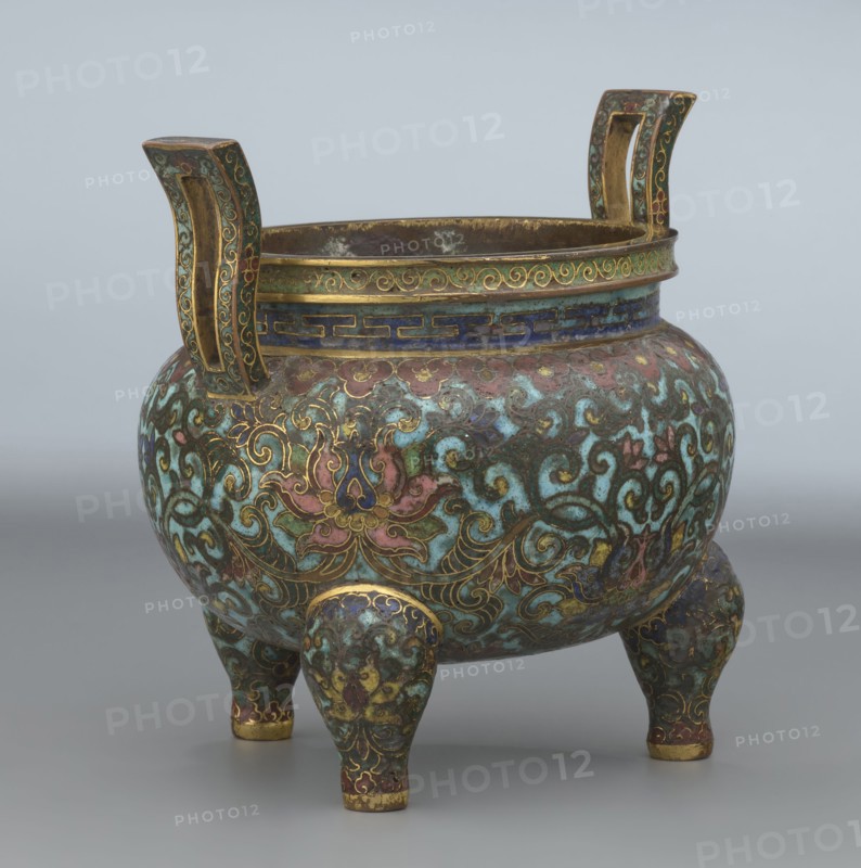 Ding-type incense burner with cover, from Ignacy Jan Paderewski 1860–1941, Chinese, Qing dynasty 1644–1911, Qianlong period 1736–1795, ceremonial ding vessel/censer decorated with lotus plant ornament, 1736–1795, China; height 11.5 cm, diameter 11.0 cm, A rounded tripod vessel with two upright handles, decorated in a dense scrolling floral pattern in turquoise, green, pink, blue, gold, brown, and purple; the body shows stylized flowers and curling vine motifs outlined in gold over a predominantly turquoise and green ground with areas of pink and blue; the rim and handles feature bands and linear patterns with gold accents, and the three stout legs are similarly patterned and tipped with gold; the interior appears darker with metallic tones, and the background is a plain light gray.
