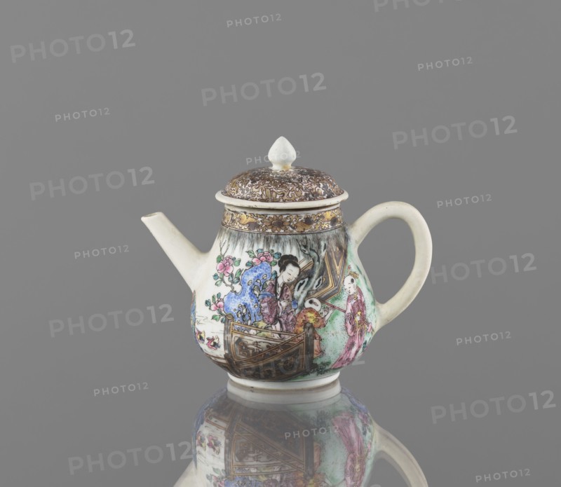 Teapot. Teapot with a straight spout and cylindrical handle. Porcelain body with white, transparent glaze. Decoration painted with onglaze enamel paints depicting figural scenes, female images, and gardens. Colored porcelain, Qing dynasty 1644–1911, 19th century, China. Height 12.5 cm; width 14.9 cm; depth 9.5 cm., A small ceramic teapot with a rounded body, short spout, and curved handle sits on a reflective surface, showing a mirror image beneath it; the teapot is predominantly white with painted scenes in colors including pink, blue, green, brown, gold, black, and pale yellow, and it has a domed lid topped with a white finial and a band of intricate brown and gold decoration around the lid and neck; the painted imagery on the body depicts stylized figures and floral motifs with areas of blue background and green shading, along with brown decorative borders and golden accents, all set against a plain grey background.