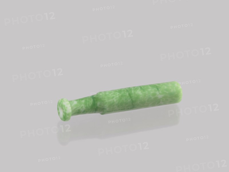 Cigarillo, creator unknown, Chinese, Qing dynasty 1644–1911, 19th century. Cast glass, green and white. Smoking tobacco pipe, height 7.9 cm, diameter 1.35 cm., A single cylindrical object lies on a pale gray background, showing a mottled green and white marbled surface. The object has a flared rounded end and a slightly tapered middle before returning to a straight cylindrical section, with a faint shadow and reflection beneath it. The overall visible colors are shades of green, white, and pale gray.
