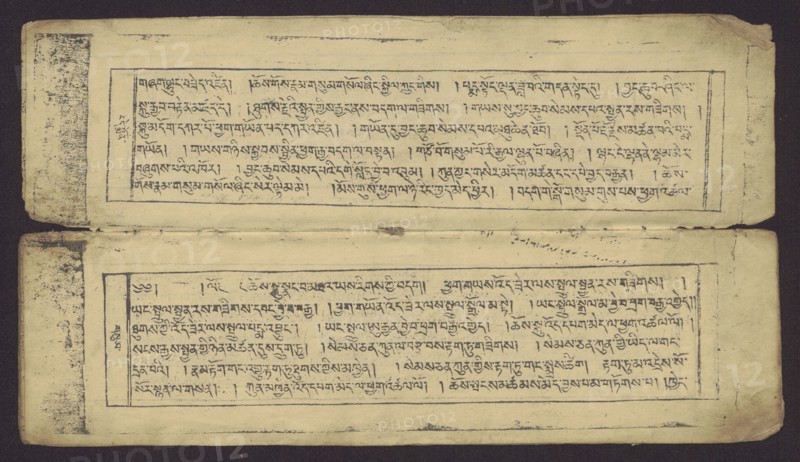 Buddhist text - Prayer for rebirth in the pure land of Sukhavati by master Raga Asja the first reincarnation of the Karma Chagme lineage, unknown creator role, Tibetan graphic prints, prayer text, Buddhist book of the pecha type, xylographic print in disciple script dbu can, top edge tied with string. Leaf numbering on recto, 16 folios in total, 15 numbered with text, the last blank. 15th folio verso handwritten in pencil in Ume script dbu med; 16th folio verso handwritten in ink upside down in the scripts of students and Ume. The original prayer text by master Raga Asja Tib. ra ga a syas, the first tulku of the Karma Chagme Tib. kar ma chags med reincarnation lineage, dates from the 17th century. 19th century, Tibet; graphic, height 30.5 cm, width 8.6 cm., A worn, rectangular double-page spread with a dark background showing an aged, yellowed paper surface. The pages contain two horizontal framed blocks, one above the other, each filled with dense handwritten script that appears in ne...