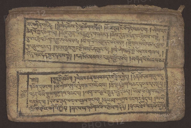 Buddhist text - Commentary on the praise of the names of Manjushri by Ga Rabjampa Kunga Yeshe Tib. 'phags pa 'jam dpal gyi mtshan yang dag par brjod pa zhugs so, unknown author/graphic artist. Buddhist art, Tibetan, graphic prints. Book in Tibetan pecha style, xylographic print in student script dbu can. 26 folios, recto page numbering, first verso, 2 pages missing. Buddhist commentary on the prayer of praise in honor of the names of the bodhisattva Manjushri Tib. 'jam dpal dbyang by Ga Rabjampa Kunga Yeshe Tib. sga rab 'byams pa kun dga' ye shes. Original text from the 15th century; this copy 19th century, Tibet. Graphics; width 24.6 cm, height 8.0 cm., A worn rectangular manuscript spread open showing two horizontal panels of dense, hand-drawn script framed by dark ink borders on aged, yellowed paper; the top and bottom panels each contain several lines of script arranged in neat rows, with visible brush or pen strokes and occasional ink blots. The paper appears creased and textured ...