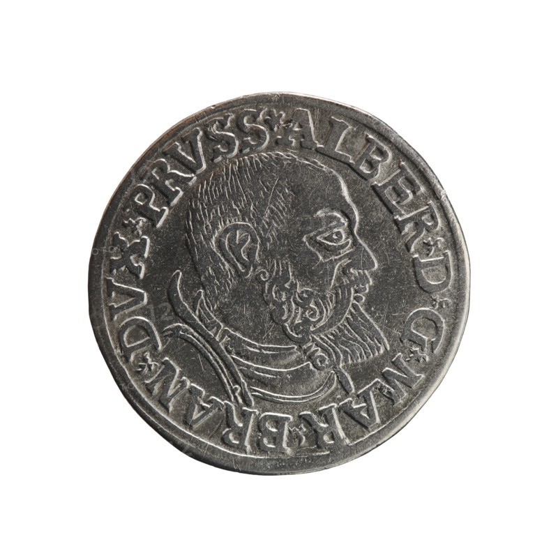 trojak; Schilling, Maciej mintmaster / publisher; Decjusz, Jost Ludwik fl. 1528–1535 co-creator / mint manager. Obverse: male bust in armour in profile to the right; short hair, beard with sideburns. Inscription around the rim: *ALBER DG MAR BRAN DVX PRVSS. Double continuous border, floral motifs between the words. Reverse: inscription in six lines within a continuous border: -III-.GROSS:AR:/.TRIPLEX./.ALBER:DVC./.PRVSSIE./-I54I-. Denomination and date between trefoil marks. 1541. Ducal Prussia 1525–1701, Königsberg mint. Coin; diameter 22.3 mm; weight 2.57 g; axis 45°., A circular metallic coin with a raised profile of a bearded man facing right, showing detailed hair and facial lines; the coin has a decorative raised border and an outer ring with raised characters around the portrait; the metal appears silver-gray with darker recessed areas creating contrast and subtle highlights on raised surfaces.