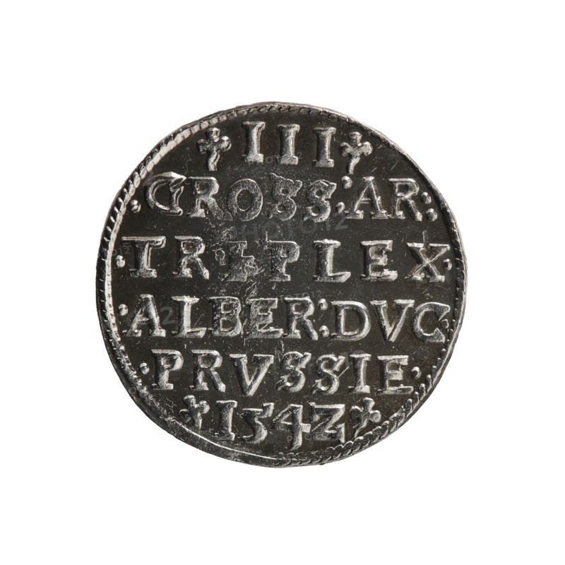 trojak, Straub Strawb, Heinrich mintmaster / publisher, Decjusz, Jost Ludwik fl. 1528-1535 mint manager / co-creator, Albrecht Hohenzollern Prince of Prussia; 1490-1568 - iconography, male busts in armour, trefoils. Obv. Male bust in armour in profile turned to the right; short hair, long beard with sideburns. In the rim an inscription beginning with a trefoil -ALBER DG MAR BRAN DVX PRVSS pearl border, floral motifs between the words. Rev. In the pearl border there is an inscription in six lines -III-.GROSS:AR:/.TRIPLEX./.ALBER:DVC./.PRVSSIE./-I54Z-. The denomination and date are between the trefoil marks. 1542. Ducal Prussia 1525-1701, Königsberg mint. Coin; diameter 21.2 mm; weight 2.71 g; axis 30 degrees., A round metallic coin with a dark silvery surface and lighter raised areas forming a pattern; the coin shows a textured rim and a series of raised characters and decorative floral-like marks arranged in several horizontal lines across its face; the surface displays scratches and w...