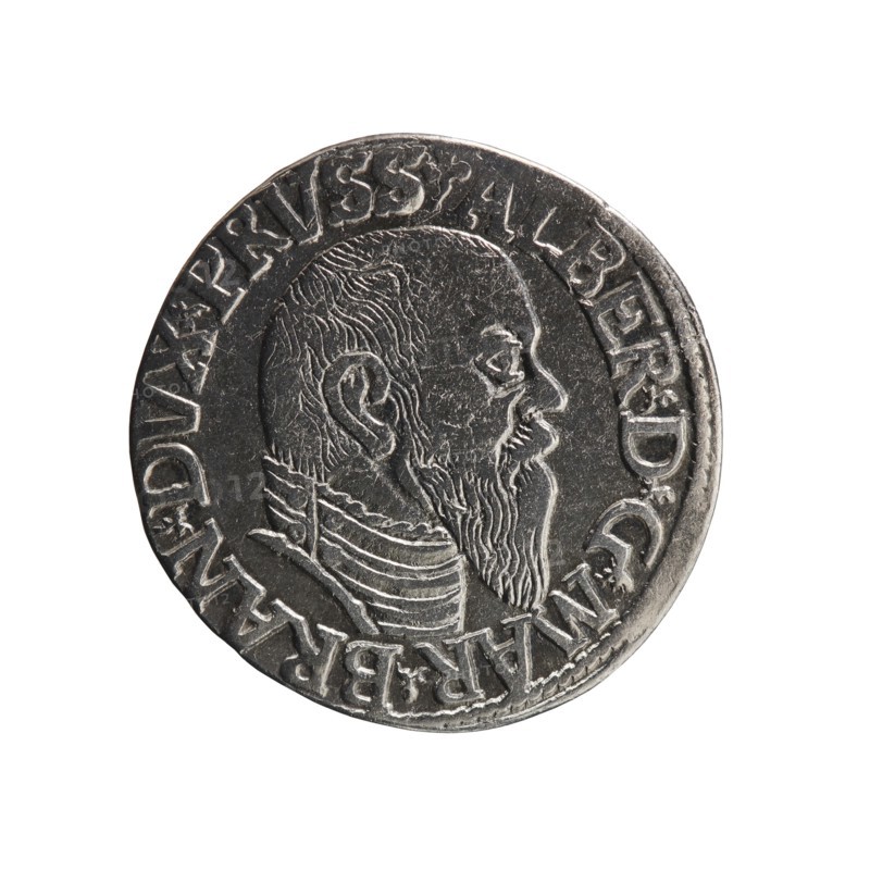 trojak; Schilling, Maciej mintmaster publisher, Decjusz, Jost Ludwik fl. 1528–1535 co-creator / mint manager; Albrecht Hohenzollern Prince of Prussia; 1490–1568 — iconography. Obverse: male bust in armour in profile turned to the right; short hair, long pointed beard with sideburns; in the rim an inscription beginning with a trefoil: -ALBER DG MAR BRAN DVX PRVSS; pearl border, plant motifs between the words. Reverse: in the pearl border an inscription in six lines: -III-/.GROSS:AR:/.TRIPLEX./.ALBER:DVC./.PRVSSIE./-1544-; the denomination and date are between trefoil marks. 1544. Ducal Prussia 1525–1701, Königsberg mint. Coin: diameter 21.4 mm, weight 2.48 g, axis 90°., A round metallic coin with a raised profile of a bearded man's head in profile facing right; the surface shows engraved hair and beard lines and a textured background; a raised rim encircles the portrait with decorative raised markings around the edge; colors visible are metallic silver and dark gray with shadows and sli...