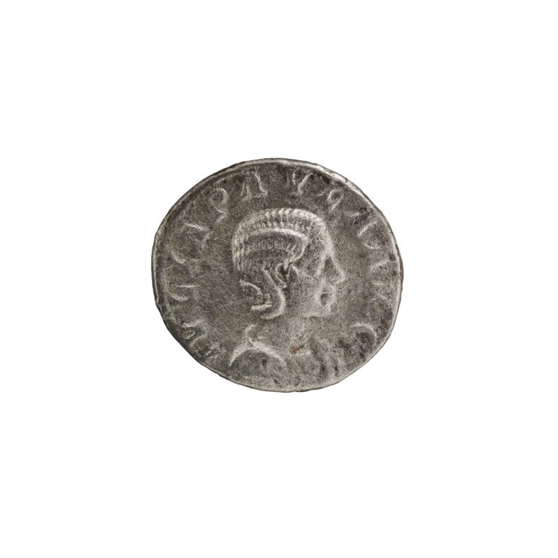 Denarius, Elagabalus 204–222; Roman emperor 218–222, issuer Julia Paula ca. 190–235; Roman empress 219–220. Obv.: IVLIAPAVLAAVG — Draped bust of Julia Paula facing right, pearl border. Rev.: CONC ORDIA — Concordia seated left, holding a patera in her right hand, resting the elbow of her left hand on the back of the throne; star in left field, pearl border. 219–220, Roman Empire; Rome. Coin, diameter 18.5–19.0 mm, weight 3.00 g., A round coin with a raised profile of a person facing right, showing detailed hair and facial features; the coin surface is textured with worn high points and recessed areas; the edge is slightly irregular; colors visible include shades of gray, silver, and darker gray tones.