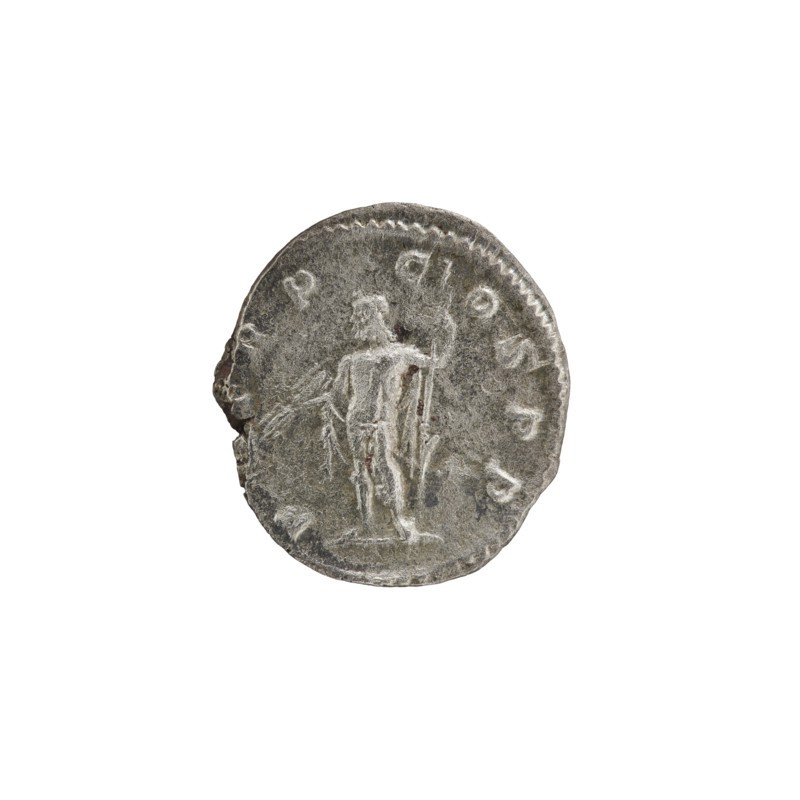 Denarius, Alexander Severus Roman emperor; 222–235 — iconography: Roman deities, Jupiter. Obv.: IMPCMAVRSEVALEXANDAVG. Bust of Alexander Severus in laurel wreath, armor and paludamentum facing right; pearl rim. Rev.: PMTRP COSPP. Jupiter naked in cloak standing straight facing left, holding a thunderbolt in his right hand and a long scepter in his left; pearl rim. Date: 222. Place of origin: Rome, Roman Empire. Medium/function: coin. Diameter: 17.0–19.5 mm. Weight: 2.35 g., A single round coin sits centered on a white background, showing a weathered metallic surface in shades of silver and gray with darker gray patina in places; the coin edge is irregular and slightly worn, and the face displays the faint raised outline of a standing human figure holding a long thin object, with subtle worn textures and shadowed grooves around the figure and along the rim.