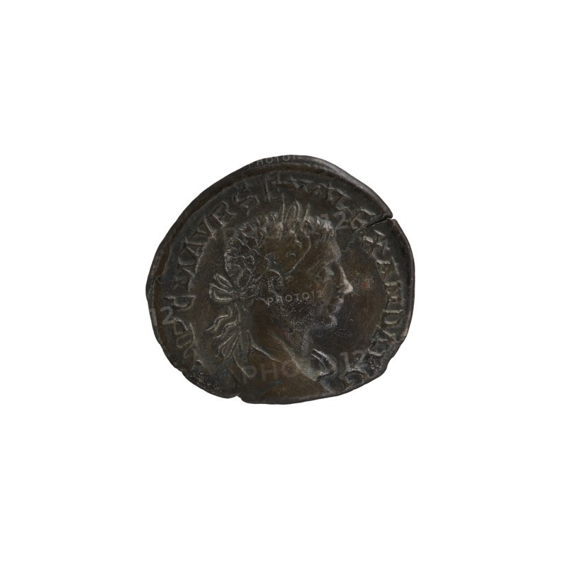 Denarius, personifications, Alexander Severus Roman emperor; 222–235 — iconography: Libertas. Obverse: IMPCMAVRSEVALEXANDAVG. Bust of Alexander Severus with laurel wreath and paludamentum facing right, pearl rim. Reverse: LIBERTASAVG. Libertas stands upright with head to left, holding a pileus in right hand and a cornucopia in left; pearl rim. 222–228. Roman Empire. Mint: Antioch on the Orontes. Coin; diameter 17.5–19.0 mm; weight 2.80 g., A round, worn metallic coin with a dark brown and greenish patina showing a raised profile of a person facing right with detailed hair and laurel-like elements, surrounded by a raised border and faint decorative relief around the edge.