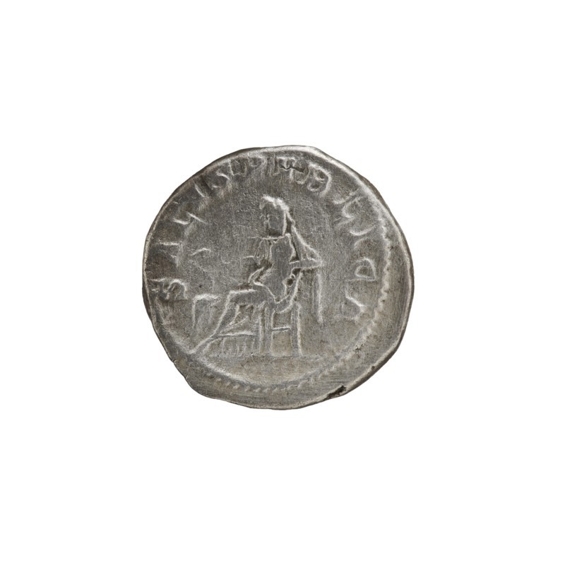 Denarius, personifications, Alexander Severus Roman emperor; 222–235 — iconography: Salus personification. Obverse: IMPCMAVRSEVALEXANDAVG — Bust of Alexander Severus with laurel wreath and paludamentum facing right, pearl rim. Reverse: SALVSPVBLICA — Salus seated facing left, holding a patera in her right hand feeding a snake coiled around an altar, left hand on the backrest, pearl rim. Date: 222–228. Place of origin: Rome. Object type: coin denarius. Diameter: 18.5–19.0 mm. Weight: 3.45 g., A round, worn metallic coin with a dull silver-gray color sits against a white background, showing a raised central depiction of a seated figure facing right on a chair with a draped garment and a faint outline of limbs and backrest, surrounded by a shallow beaded border and several low-relief marks along the rim.