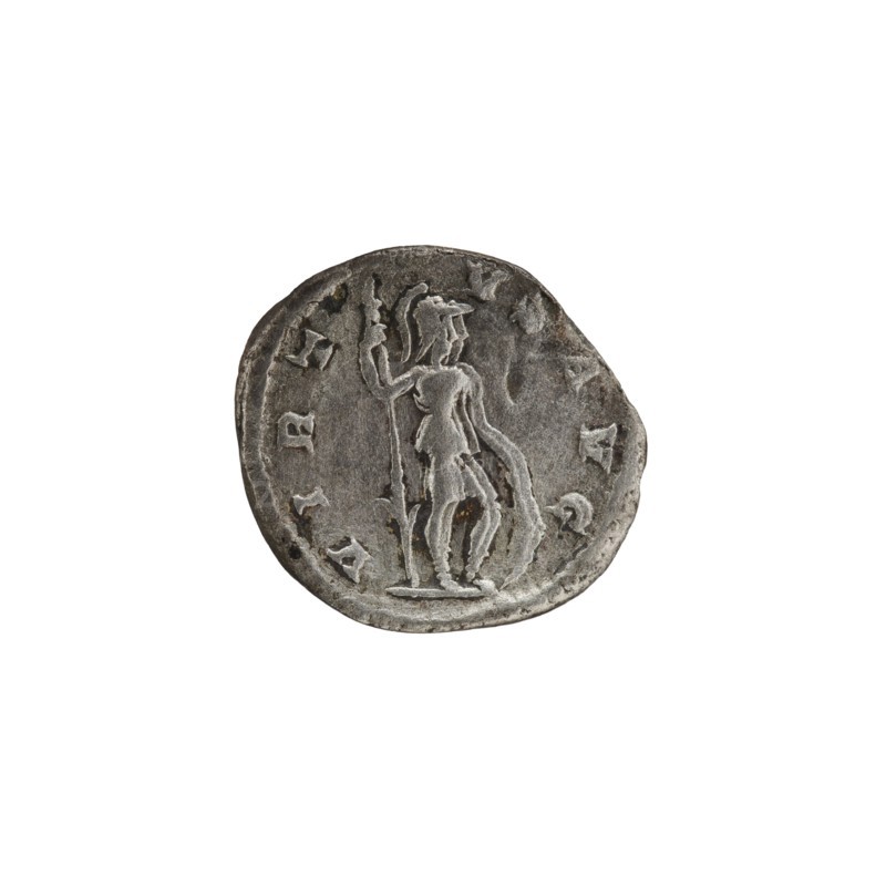 Denarius, personifications, Virtus personification, Alexander Severus Roman emperor; 222–235 - iconography. Obverse: IMPCMAVRSEV ALEXANDAVG. Bust of Alexander Severus with laurel wreath and paludamentum facing right, pearl rim. Reverse: VIRTVSAVG. Virtus in military garb and helmet facing right, holding a spear point down in his right hand, resting his left hand on a shield at his feet, pearl rim. Date: 222–228. Roman Empire 27 BC–476, Rome. Coin. Diameter: 17.0–19.0 mm. Weight: 2.80 g., A round, worn coin with a metallic gray surface showing a raised, central figure standing and holding a long staff; the figure appears to wear a helmet and a draped garment. The coin's edge is irregular and the surface shows darker gray spots and lighter gray highlights from wear and relief. The background around the coin is plain white.