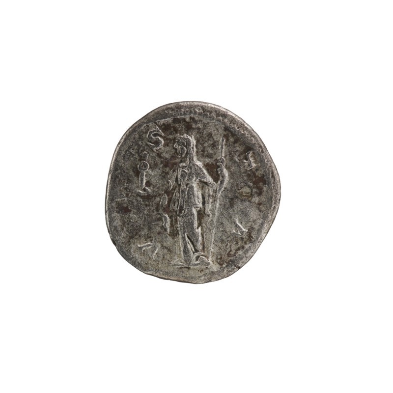 Denarius depicting Julia Mamaea ca. 180–235; Augusta 222–235 and Alexander Severus 208–235; Roman emperor 222–235. Obverse likely shows imperial portraits; reverse features Roman deity Vesta mythology. Iconography attributed to Julia Mamaea, dated 225–235, Rome, Roman Empire 27 BC–476. Coin; diameter 18.5–19.0 mm, weight 2.65 g., A round, worn coin with a textured, metallic surface in shades of gray and dark silver, showing a raised depiction of a standing human figure holding a tall staff; the figure appears in lighter silver relief against a darker silver background, with some areas of darker brownish-gray patina and slight irregularities around the coin's edge.